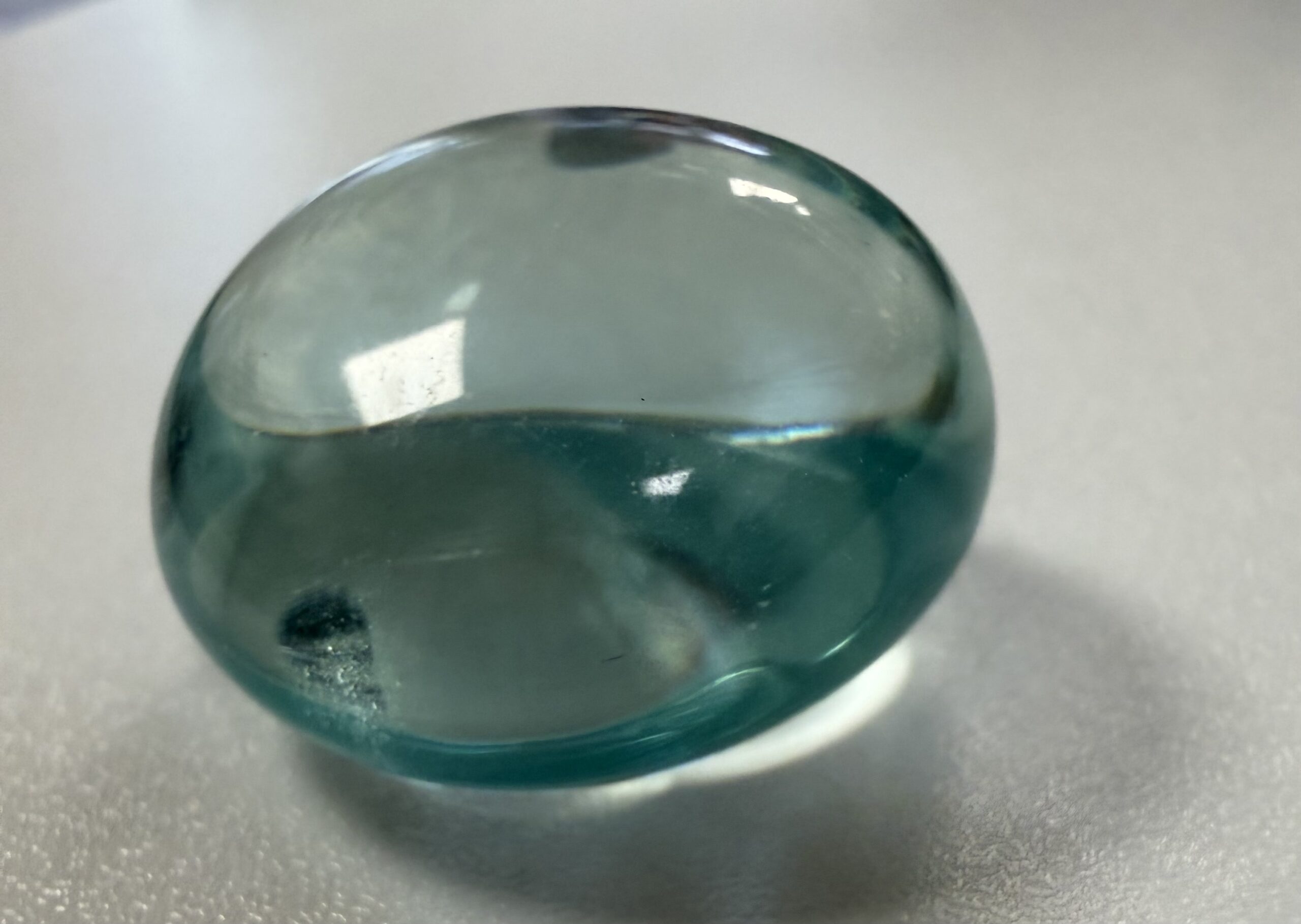 Petit Galet En Obsidienne Bleue